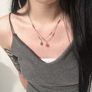 OFUSE - flower ball necklace