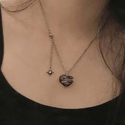 OFUSE - dark heart necklace