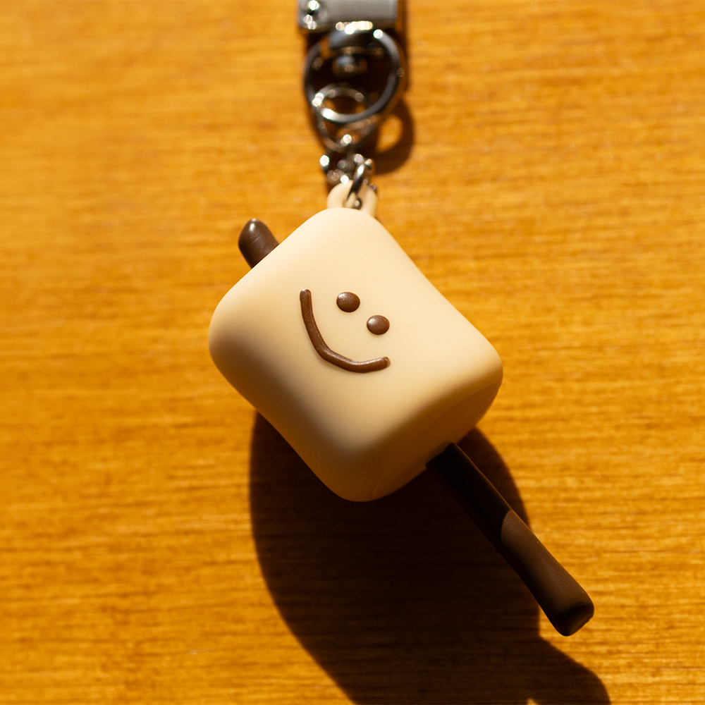 tanning marsh keychain