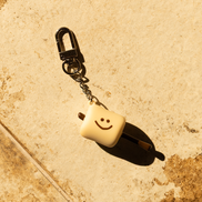tanning marsh keychain