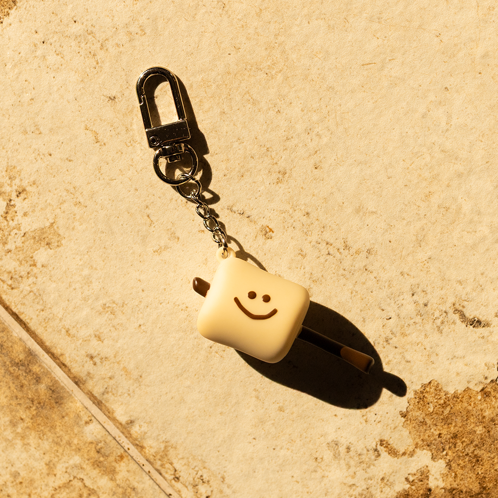 tanning marsh keychain
