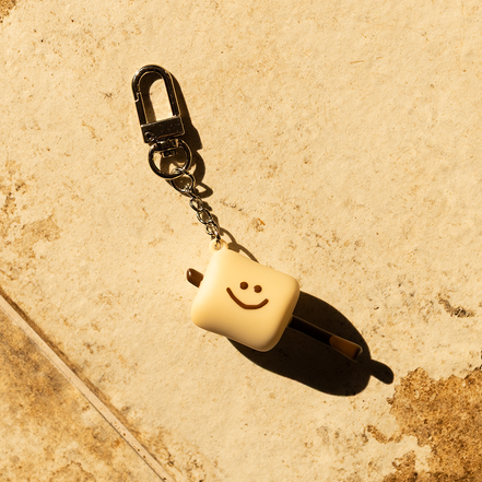 tanning marsh keychain