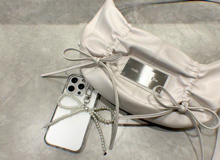 MATIN KIM - HALF SHIRRING RIBBON ROUND BAG (IVORY)